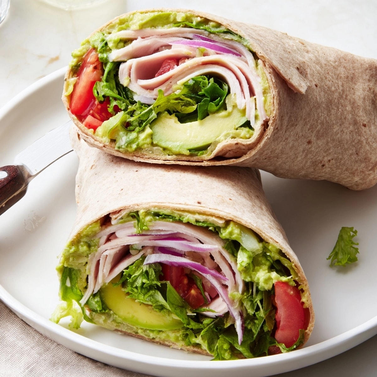 Turkey Avocado Wrap, bursting with fresh flavors and vibrant colors ready for a quick lunch.