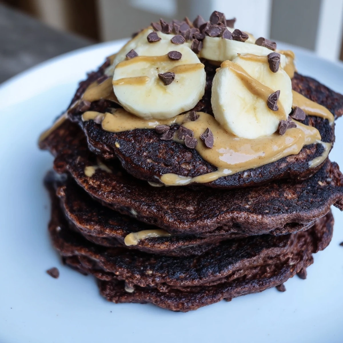 Mouthwatering Banana Chocolate Pancakes, made with ripe bananas and rich cocoa flavor.