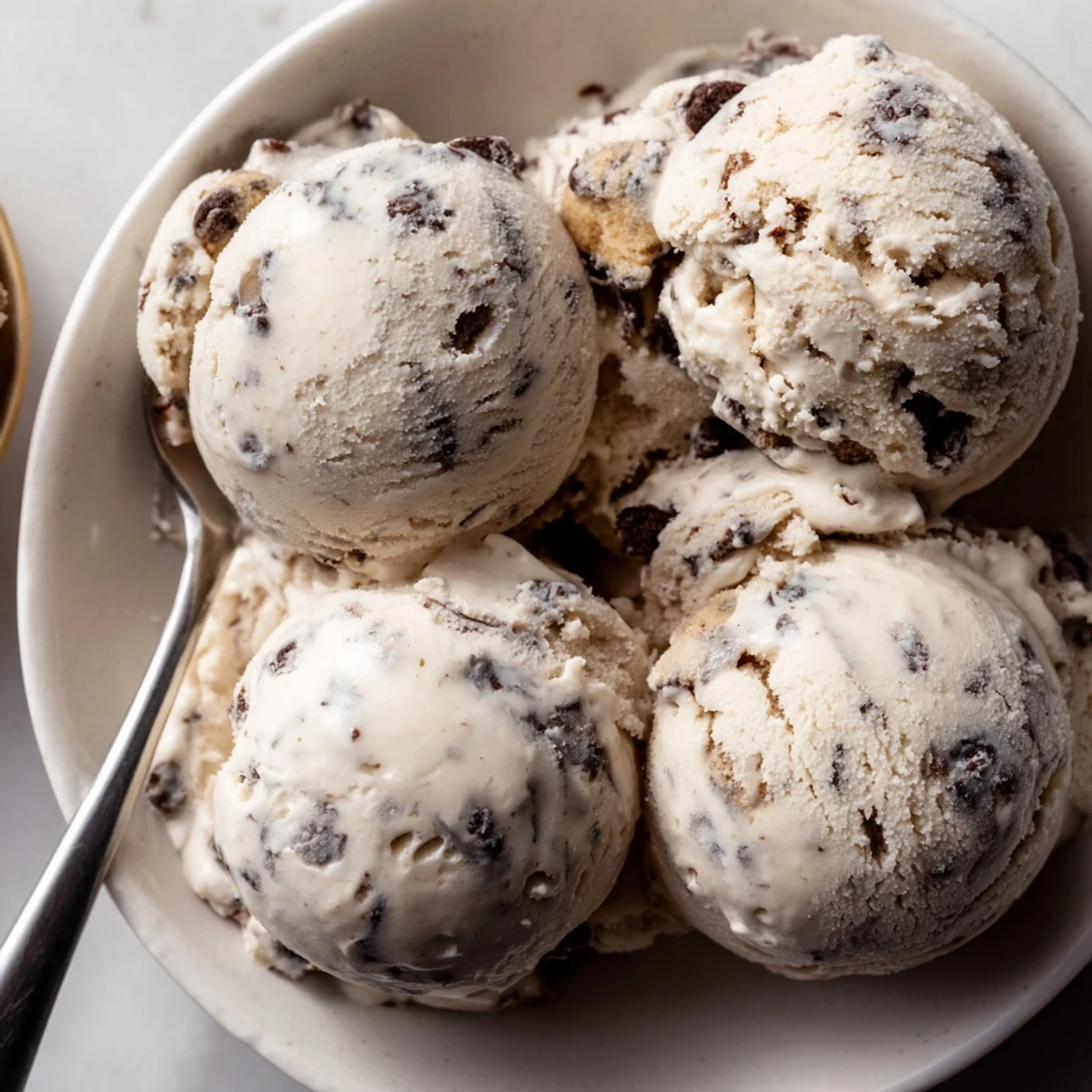Creamy Cottage Cheese Ice Cream with cookie dough bites, a delightful frozen treat.  