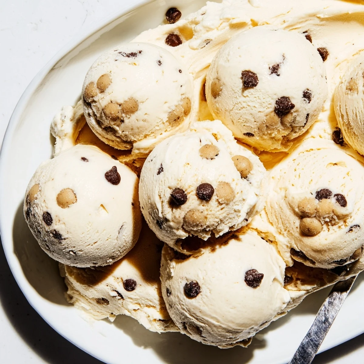 Deliciously smooth Cottage Cheese Ice Cream featuring bites of sweet cookie dough goodness.