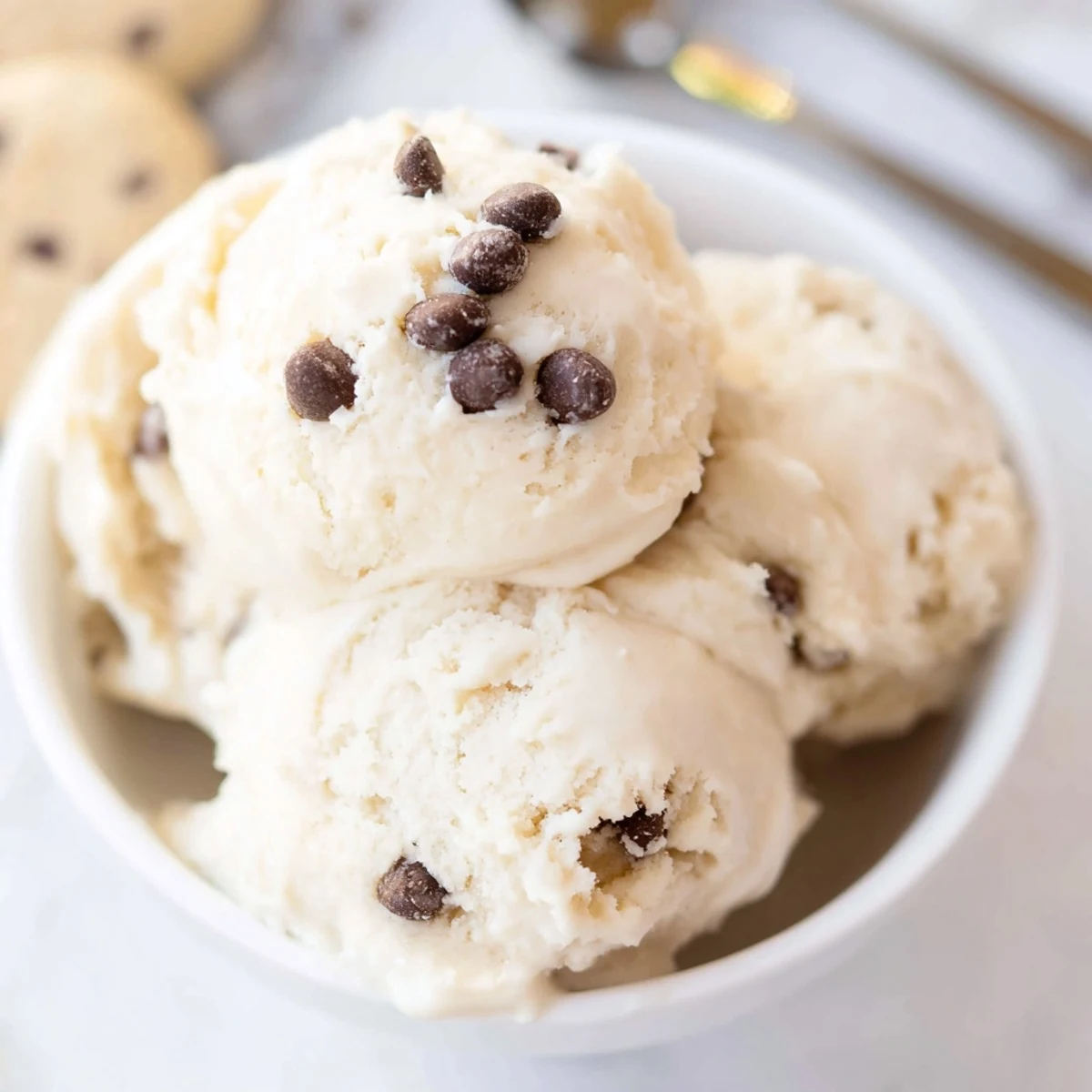 Delicious homemade cottage cheese ice cream featuring chunks of chocolate chip cookie dough.  