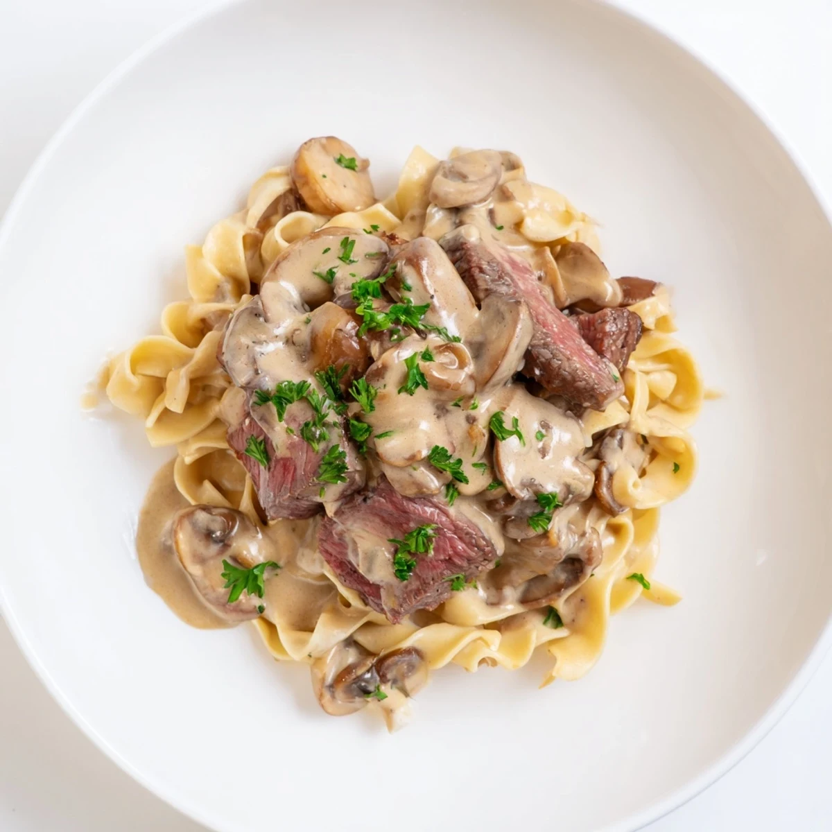 Creamy Mushroom Beef Stroganoff: A rich, beefy and mushroom-filled classic served over buttery egg noodles.