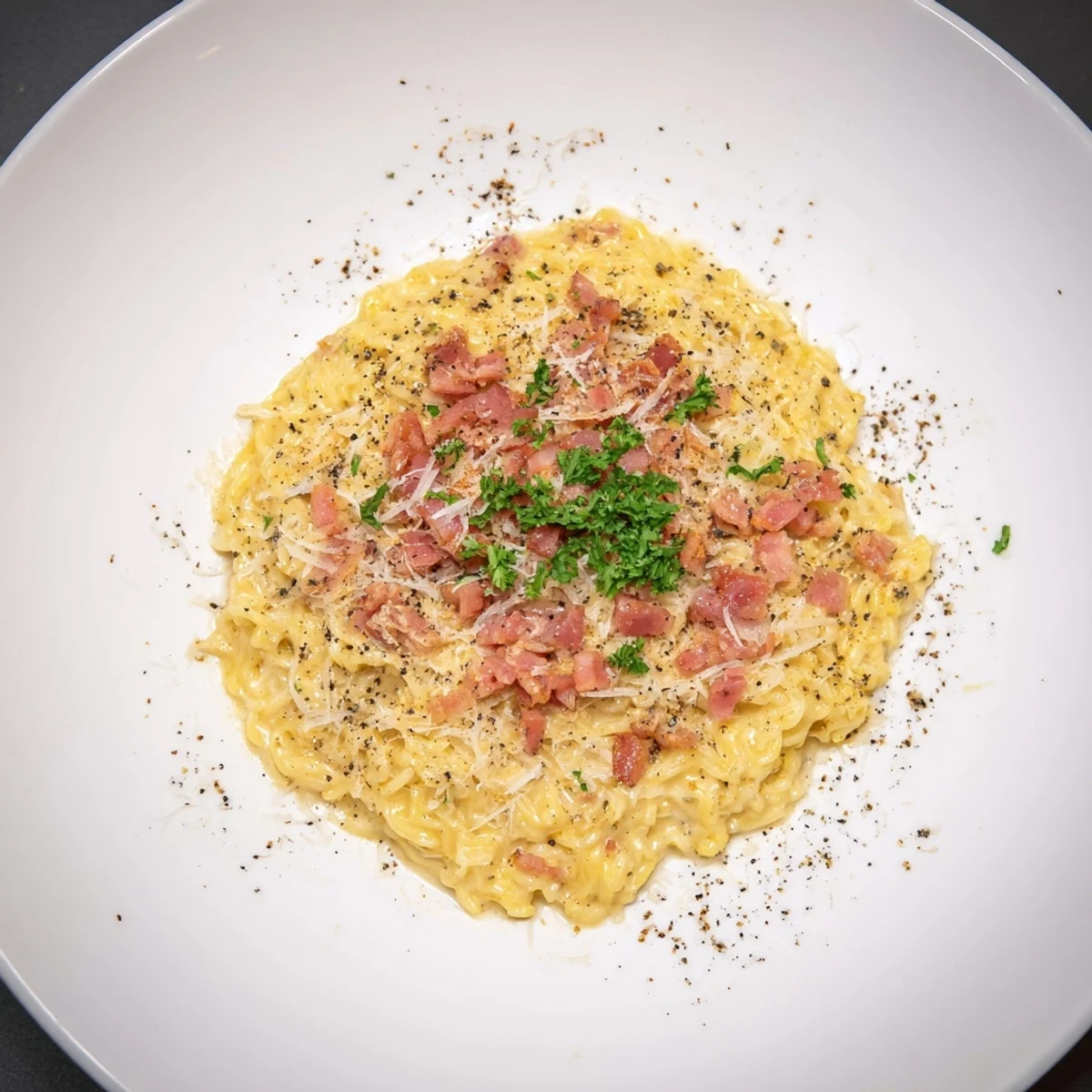 Carbonara Ramen Fusion: Creamy, cheesy ramen with crispy bacon, ready in just 15 minutes.