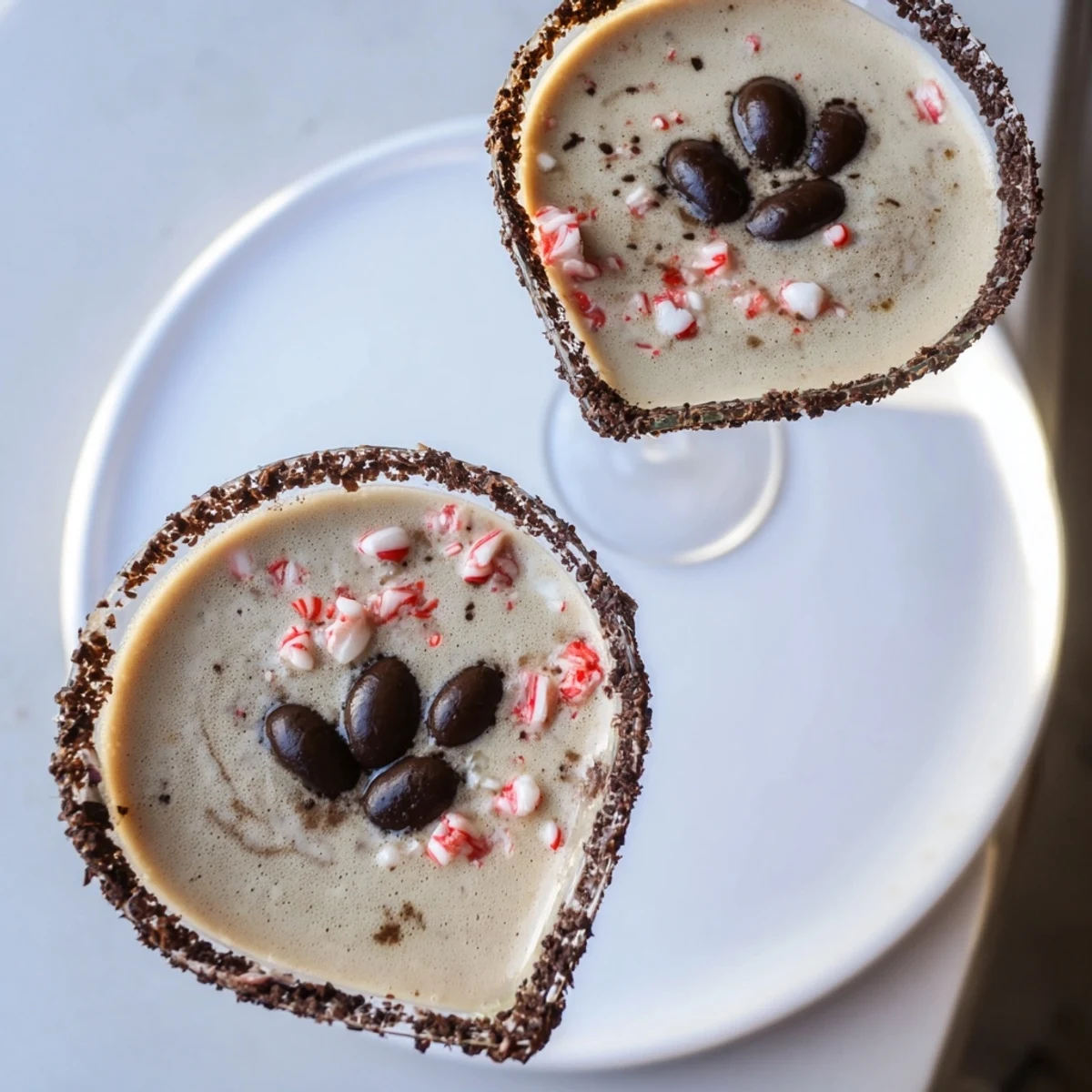 Chocolate-rimmed Peppermint Espresso Martinis served in elegant glasses, a perfect adult beverage for celebrations.