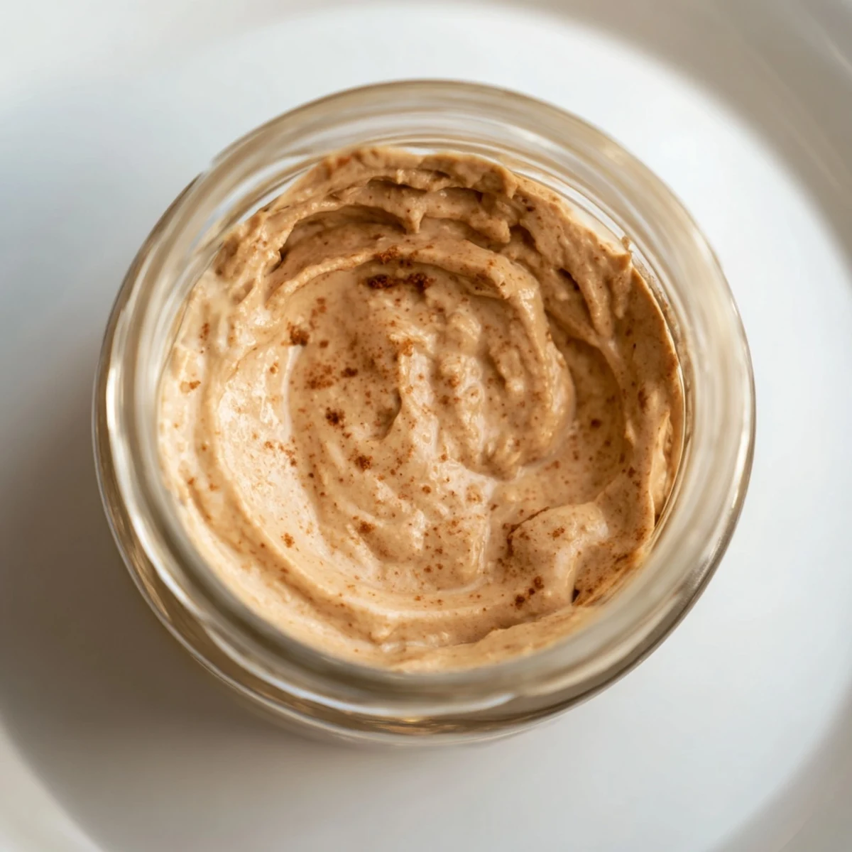 Close-up of creamy Quick Christmas Cookie Butter Spread, ready to be slathered on warm toast.