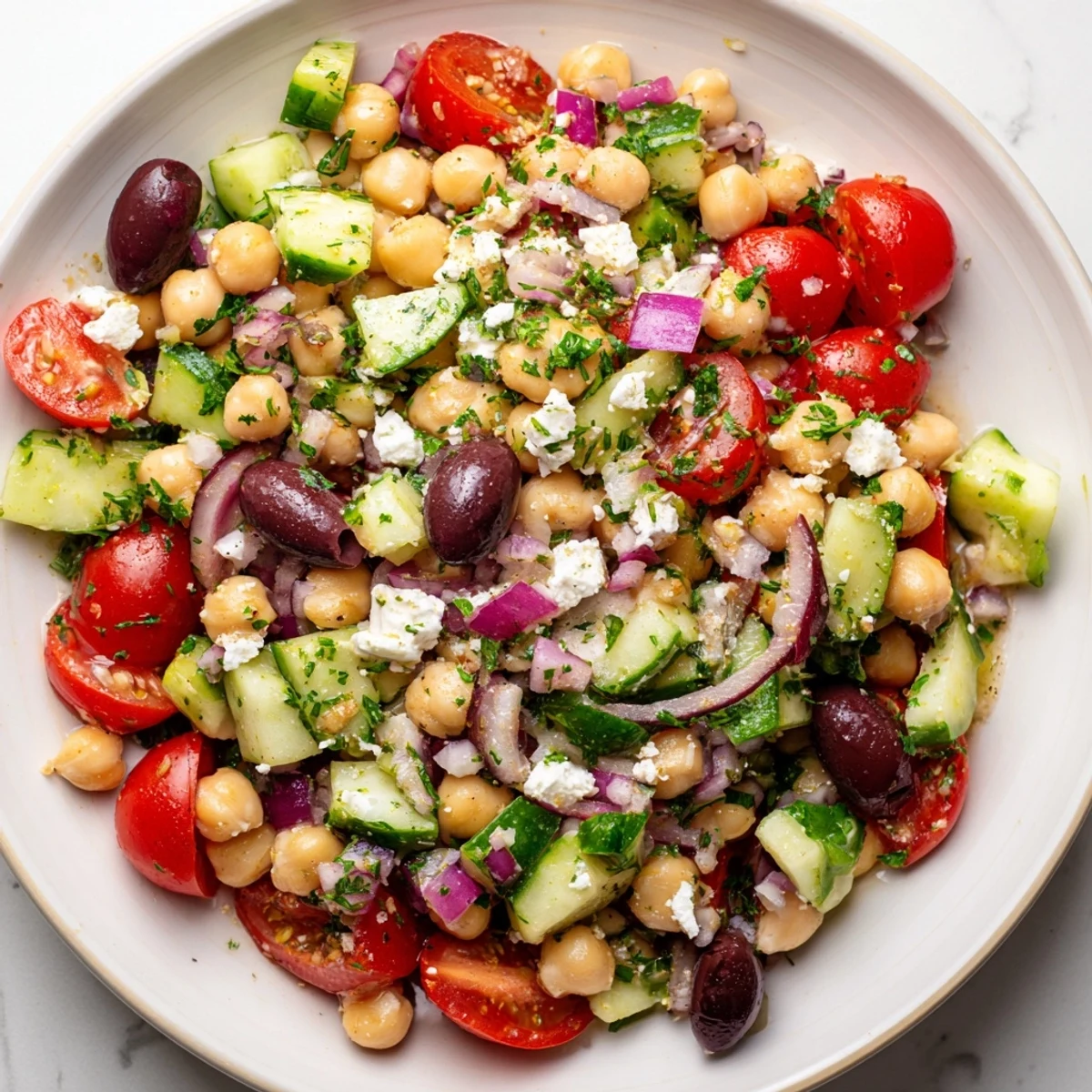 Imagine a refreshing bowl of flavorful Mediterranean Chickpea Salad, ready to eat in under fifteen minutes.