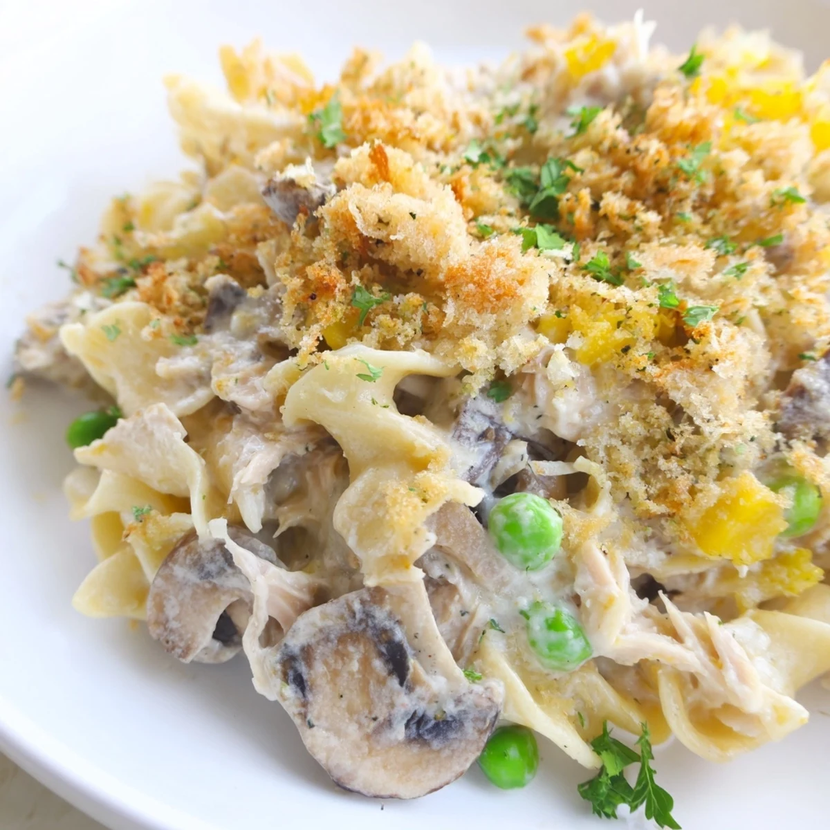 Delicious, bubbly Tuna Noodle Casserole with a crispy topping, perfect for a comforting weeknight meal.