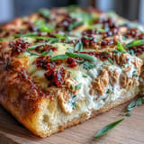 Golden baked chili crisp tuna melt flatbread, a quick and flavorful appetizer.