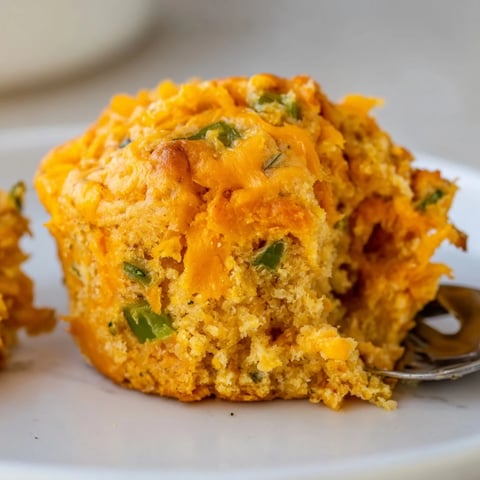 Savory Cheddar Jalapeño Sweet Potato Cass Muffins ready to enjoy warm with butter.  