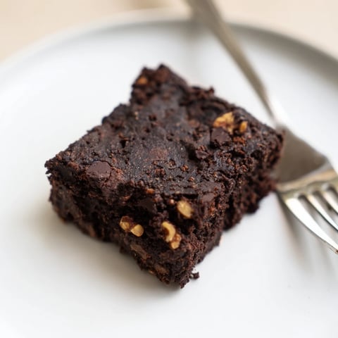 Rich, fudgy zero-waste brownies using nut-milk pulp, perfect for dessert lovers.  