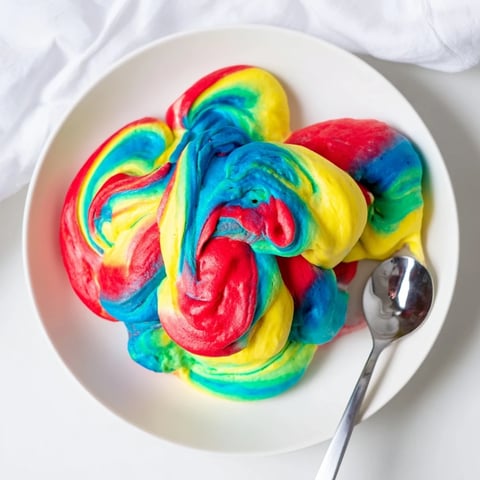 Fluffy cloud bread in vibrant colors, perfect for a fun breakfast treat.  