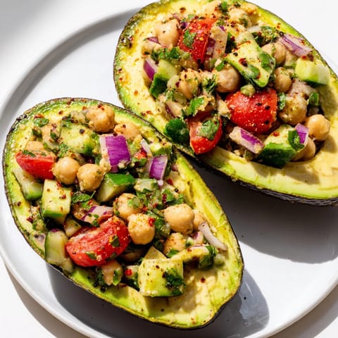 Imagine fresh, creamy Avocado Chickpea Breakfast Boats, a quick &amp; healthy vegetarian start.