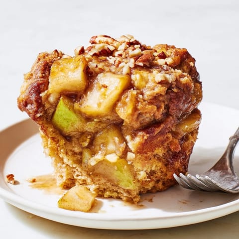 Decadent caramel swirls and apple chunks fill these delightful muffins, ideal for snacking.  