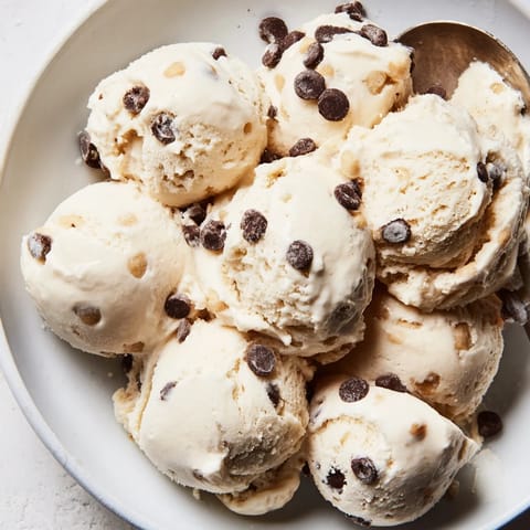 Guilt-free Cottage Cheese Ice Cream topped with rich cookie dough for indulgent flavor.  