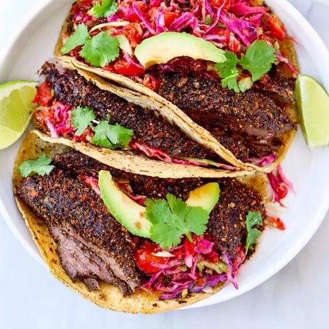 These Coffee-Rubbed Steak Tacos showcase tender steak with smoky coffee seasoning, served with a zesty salsa.